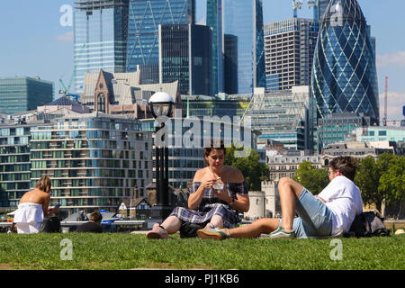 Londoners and tourists enjoying the sunshine in Potters Fields Park on another very hot day in the capital. According to the Met Office the heatwave is to continues in the UK and parts of Europe in coming days with record temperatures expected.  Featuring: Atmosphere, View Where: London, United Kingdom When: 03 Aug 2018 Credit: Dinendra Haria/WENN Stock Photo