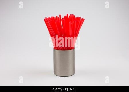 Red plastic straws Stock Photo