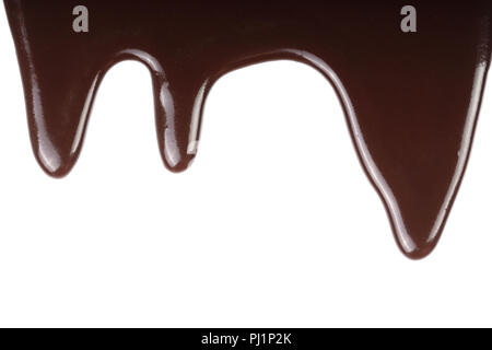 Melted chocolate dripping isolated on white background. Stock Photo