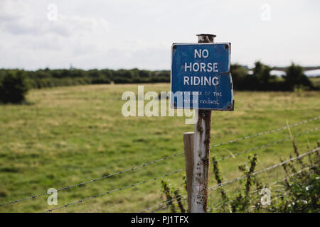 Sign saying 'no horse riding by order of the Parish Council' in the countryside near Bristol Stock Photo
