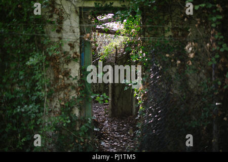 Derelict building that was once part of the terminal of the Aust Ferry at Old Passage which crossed the Severn before the Severn Bridge was built Stock Photo