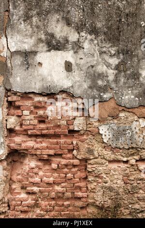Old and damaged wall texture with old white paint Stock Photo