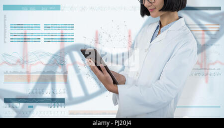 Composite image of doctor using digital tablet against white background Stock Photo