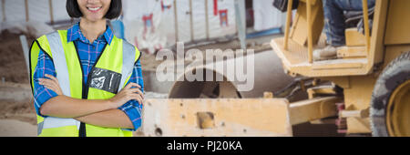 Composite image of female architect standing with arms crossed against grey background Stock Photo