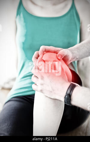 Composite image of emerging man doing fitness exercises with a woman Stock Photo