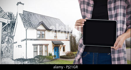 Composite image of female architect showing digital tablet against white background Stock Photo