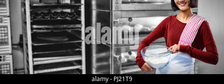 Composite image of smiling female chef mixing flour in bowl with whisk Stock Photo