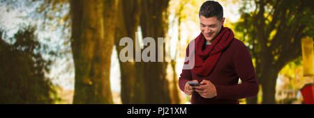 Composite image of man using mobile phone Stock Photo
