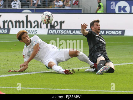 duels: Yuya Osako (Bremen, 8) - David Abraham (Eintracht Frankfurt, 19), ----- after defaults of the DFL German Football League, it is prohibited in the stadium and / or from the game made photos in the form of sequence images and / or video-like photo galleries to be used or recycled. // DFL regulations prohibit any use of photographs as image sequences and / or quasi-video ---- | usage worldwide Stock Photo