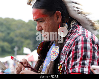 Southhampton, United States of America. 03rd, Sep 2018. A Native American prepares to dance during the celebration of the 72nd annual Shinnecock Indian Powwow over the Labour Day weekend in Southampton Long Island New York in Southhampton, United States of America, 03 September 2018. (PHOTO) Alejandro Sala/Alamy News Stock Photo