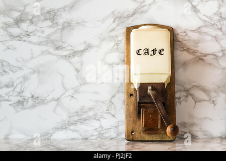 Old manual wooden coffee grinder machine Stock Photo
