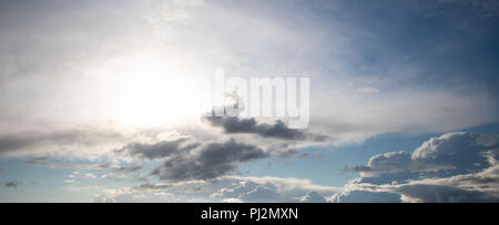 Cloudy veil in the early evening Stock Photo