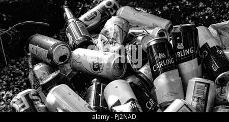 A pile of empty beer cans and bottles Stock Photo