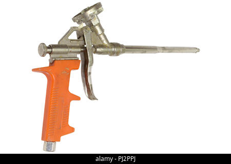 mounting foam gun with the orange plastic handle isolated on white background with clipping path Stock Photo