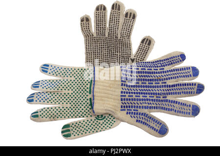 knitted gloves for manual labor. anti-skid covering, made of colored rubber dots, neatly laid out and isolated on white background, with clipping path Stock Photo