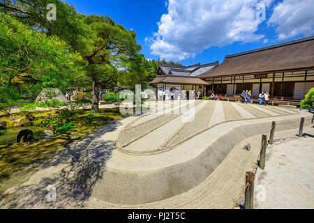 Kyoto, Japan - April 28, 2017: tourists around zen garden in Ginkakuji Temple. Ginshadan sand pattern representing the sea. Ginkaku-ji or Silver Pavilion, officially named Jisho-ji, is a Zen temple. Stock Photo