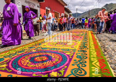 Antigua, Guatemala -  March 15, 2015: Lent procession carpet in colonial town with most famous Holy Week celebrations in Latin America. Stock Photo