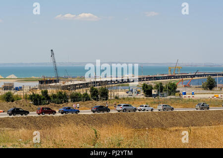 Taman, Russia - July 12, 2017: Construction of a bridge across the Kerch Strait, a view of the coastline and the connection Tuzla Spit from the Taman  Stock Photo