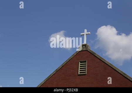 church roof with steeple and sky background Stock Photo