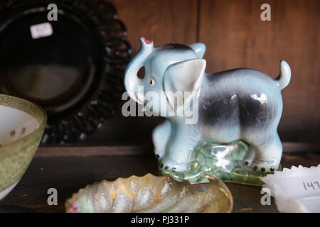 elephant figurine on shelf Stock Photo