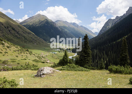 View of the yurt settlement of the valley of Altyn-Arashan in Kyrgyzstan Stock Photo