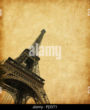 Eiffel Tower in spring time, Paris, France. Photo in retro style. Added  paper texture. Stock Photo