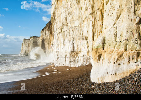 Chalk cliffs near Tide Mills between Seaford and Newhaven, East Sussex, Enlgand in a high tide, selective focus Stock Photo