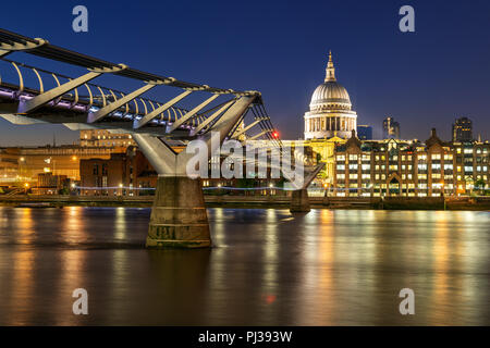 St paul cathedral with millennium bridge sunset twilight in London UK. Stock Photo
