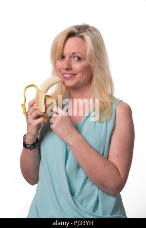 Eating a Banana with smile Stock Photo