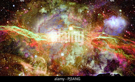 Nebula and stars in deep space. Science fiction wallpaper. Elements of this image furnished by NASA. Stock Photo