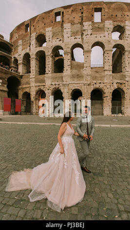 Wedding couple near Colosseum in Rome, Italy, Europe Stock Photo - Alamy