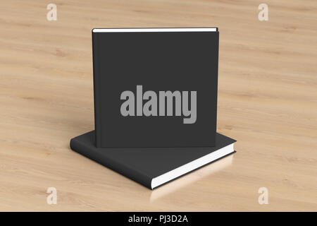 Square black blank book cover mockup standing on square blank book with clipping path around books on wooden background. 3d illustration Stock Photo