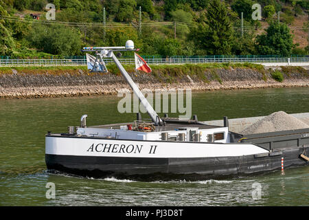 Acheron II (Pushtow cargo barge, 198m) transporting aggregates on the river Rhine near Kestert; view of the bow. Stock Photo