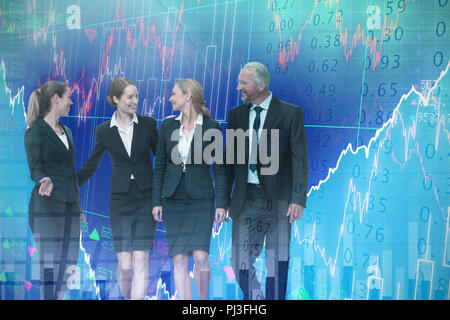 Composite image of businessman looking at female colleagues talking against white background Stock Photo