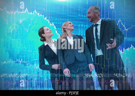 Composite image of businessman talking to female colleagues against white background Stock Photo