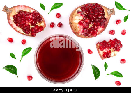 A glass of pomegranate juice with fresh pomegranate fruits decorated with leaves isolated on white background. Top view. Stock Photo