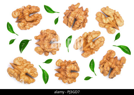 walnut kernels decorated with leaves isolated on white background. Top view. Flat lay Stock Photo