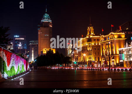 SHANGHAI, CHINA - MAY 17, 2018: Street next to the waterfront of Waitang and the buildings of Shanghai in China Stock Photo