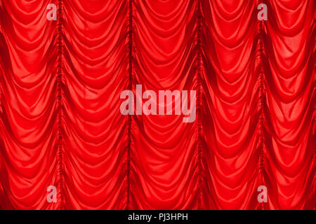 Red waving tulle curtain. Background photo texture, frontal view Stock Photo