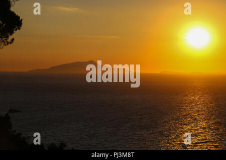 Mount  Vesuvius in golden light at sunset in the Gulf of Naples in Italy, Europe Stock Photo