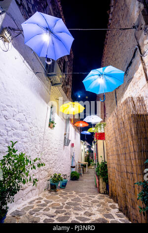 Night view of the traditional village of Areopoli in Mani region with the picturesque alleys and the stone built tower houses,  Peloponnese, Greece Stock Photo