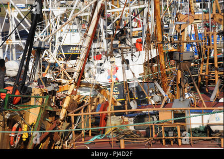 A tangled jumble of deck gear on the scallop fishing dredgers in Kirkcudbright Harbour, Dumfries and Galloway, SW Scotland Stock Photo