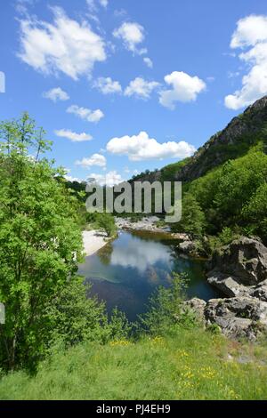 Thueyts (south-eastern France): The 'Pont du diableÓ, arch bridge stretching across the Ardeche river, a protected natural environment registered as a Stock Photo