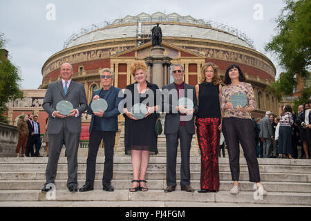 (left to right) Randolph Churchill, Roger Daltry, Eve Ferret of Chelsea Arts Club, Eric Clapton, Katie Derham and Women's Equality Party founder Catherine Mayer outside the Royal Albert Hall, London, at the unveiling of 11 engraved stones recognising key people in the building's history ahead of its 150th anniversary. Stock Photo