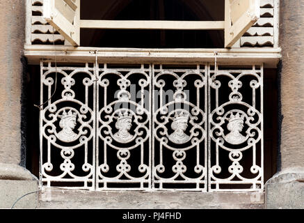 MUMBAI, INDIA – October 23 2017: Vintage cast iron railings showing effigy of Queen Victoria, on a residential building. Stock Photo