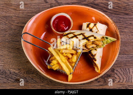 Pork Burrito with French potato Stock Photo