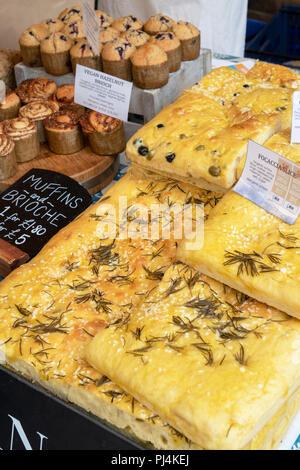 Focaccia bread for sale on the The Artisan Baker stall at stroud farmers market. Stroud, Gloucestershire, England Stock Photo