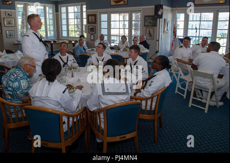 Interior Communications Electrician Micah Kvalvik speaks to members of the LA  Yacht Club and fellow Sailors