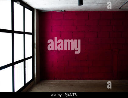magenta color brick wall background with frosted glass Stock Photo