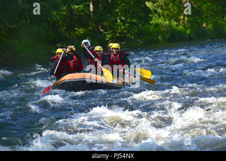 Rafting in the gorges of the Allier river from Monistrol-dÕAllier. Raft in the rapids Stock Photo